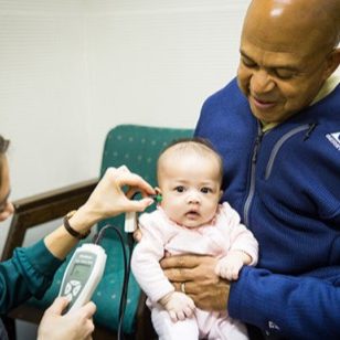 dad-baby-examining-ear