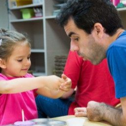 dad-blowing-daughter-hand