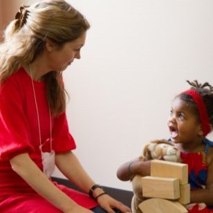 kids-playing-blocks-with-adult